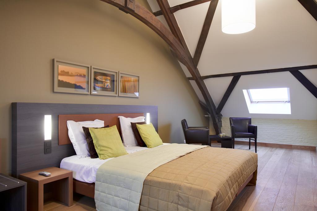 Het Godshuis Hotel Sint-Laureins Værelse billede