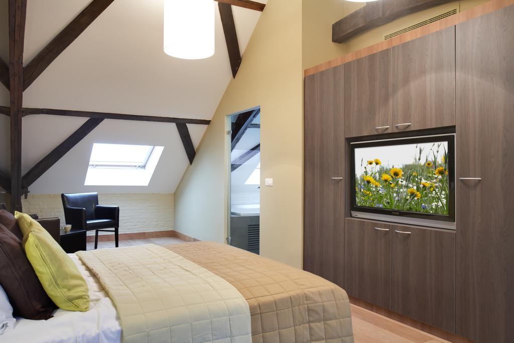 Het Godshuis Hotel Sint-Laureins Værelse billede
